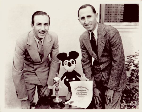 1928-Walt-and-Roy-photo-with-Mickey-and-Oscar-trop